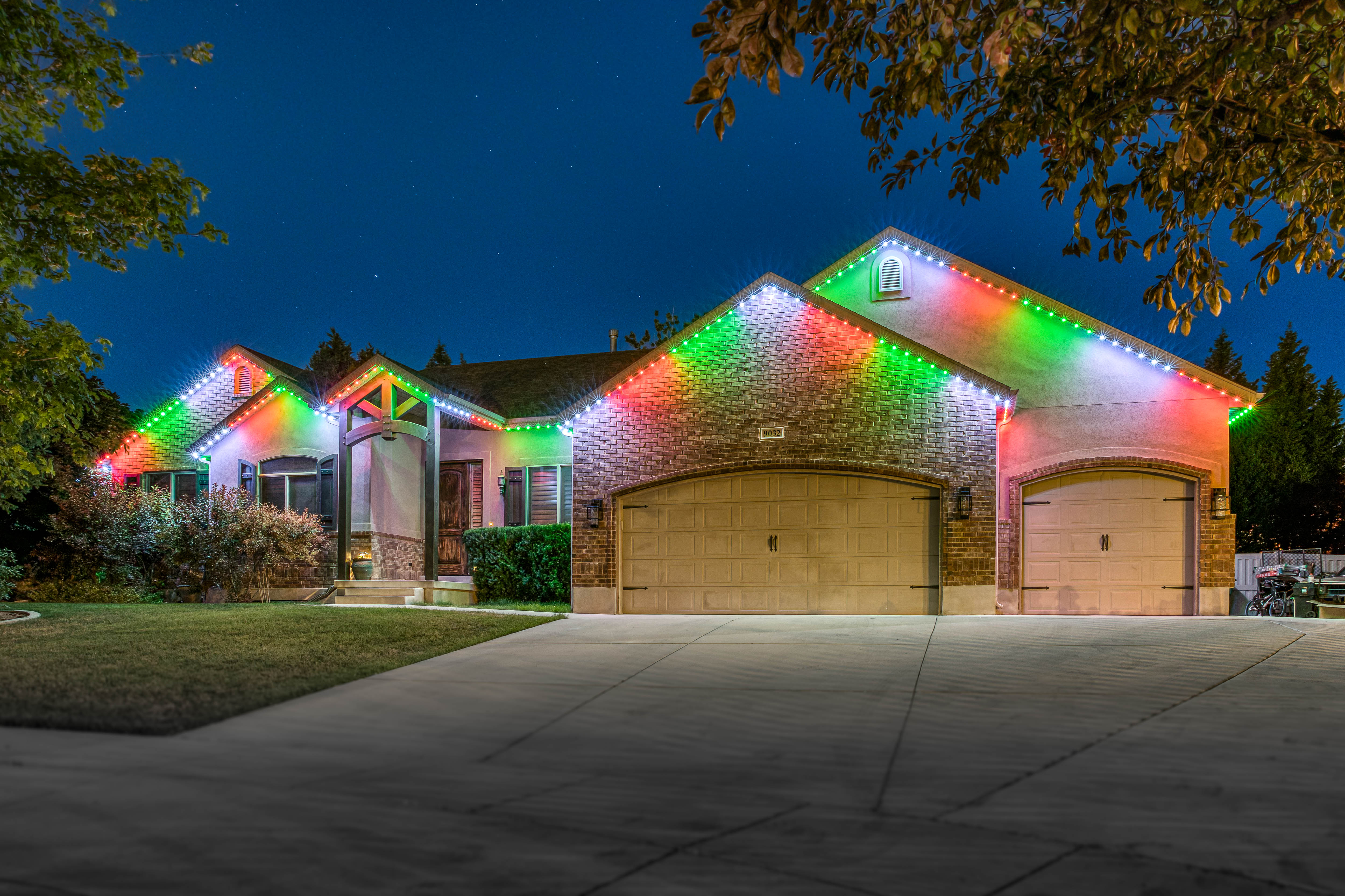 Central Nebraska home with LED roofline lighting at night